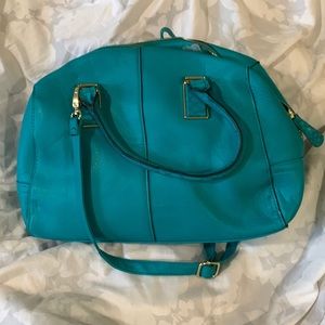 turquoise green medium size had bag ,good to add your own flare and style.